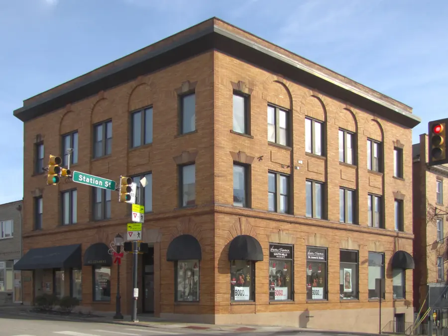 A three-story brick bank building on a corner in downtown Bridgeville