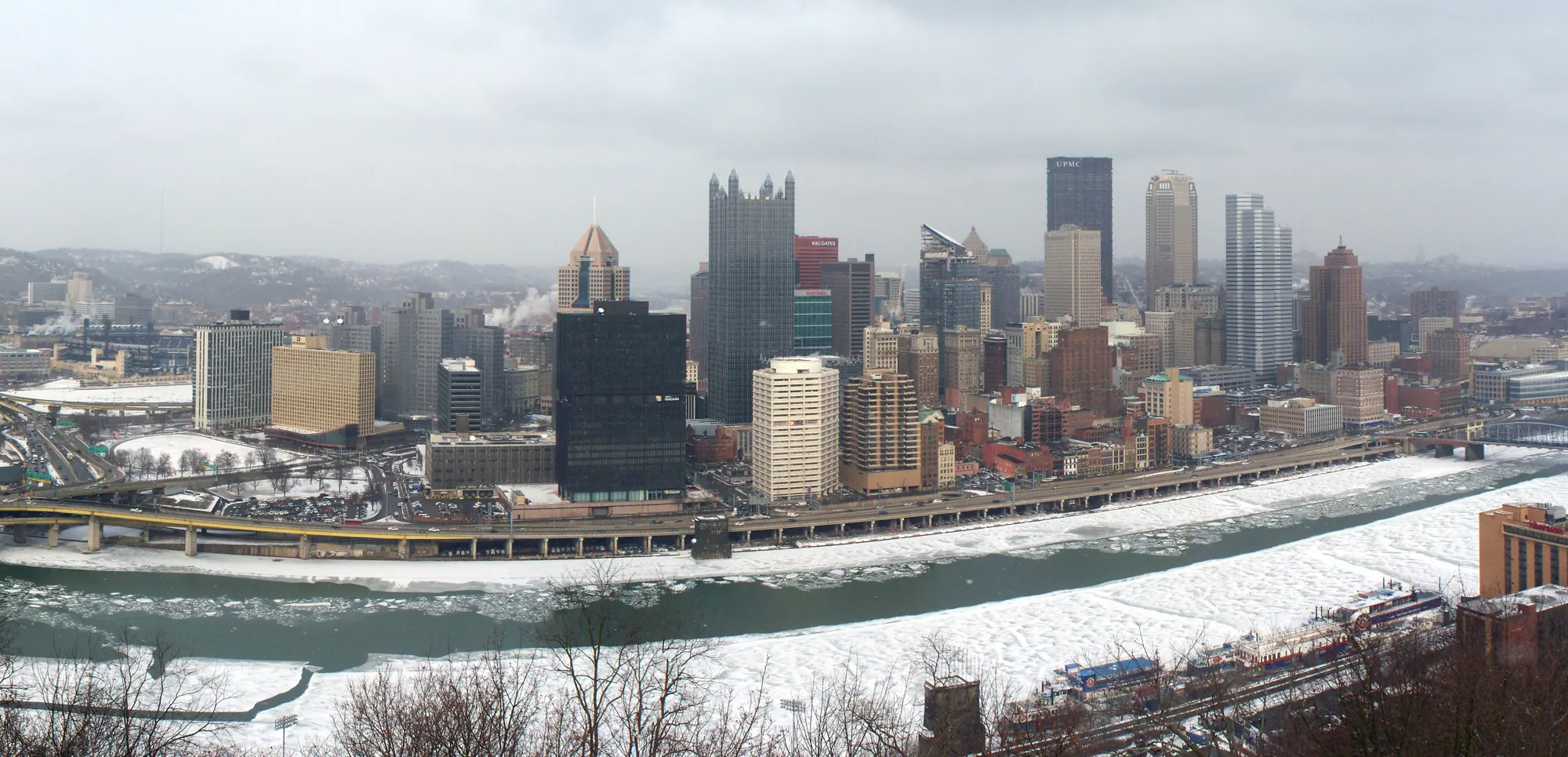 Downtown Pittsburgh under snow, with ice on the Monongahela River, seen from Mount Washington