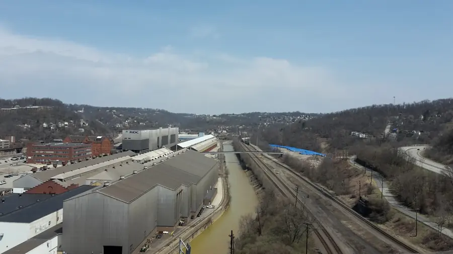 Industrial buildings and rail lines in the Turtle Creek valley, seen from the George Westinghouse Bridge
