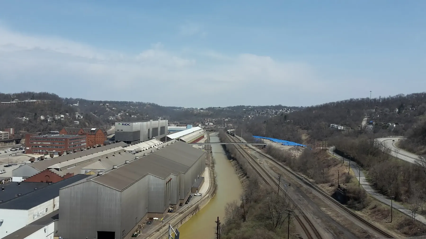 Industrial buildings and rail lines in the Turtle Creek valley, seen from the George Westinghouse Bridge